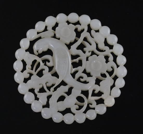 A fine Chinese white jade disc, 18th/19th century, D. 5.7cm
